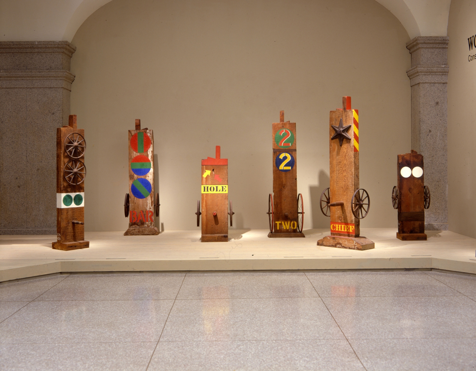 Installation view of Robert Indiana: Wood Works, National Museum of American Art, Washington, D.C., May 1&ndash;September 3, 1984; left to right: Ge (1960), Bar (1960), Hole (1960), Two (1962), Chief (1962), and Virgin (1960) . Photograph Archives, Smithsonian American Art Museum