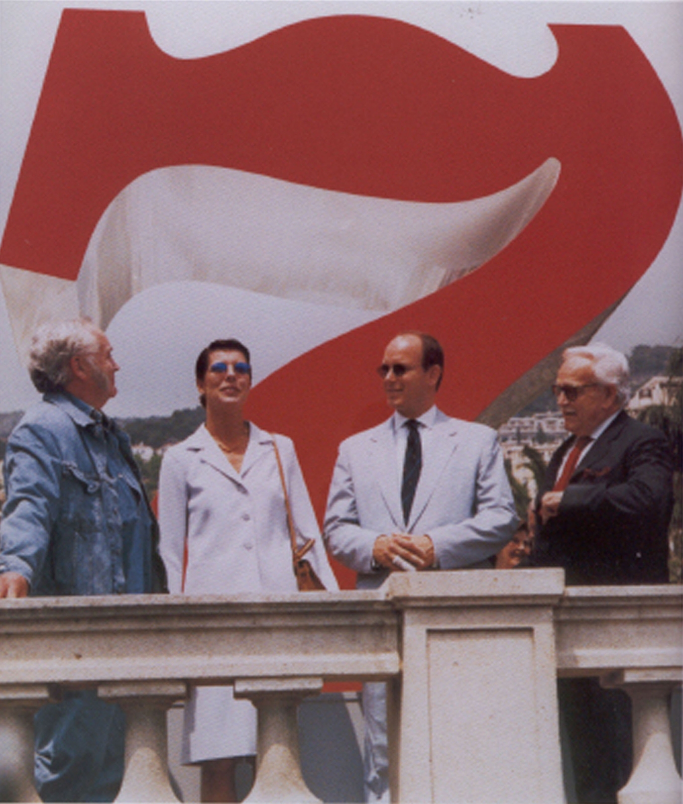 Left to right: Indiana, Princess Stephanie of Monaco, Prince Albert II of Monaco, and an unidentified man, in front of Indiana&rsquo;s sculpture Seven (1980) in Monte Carlo, 1997

Courtesy of the artist