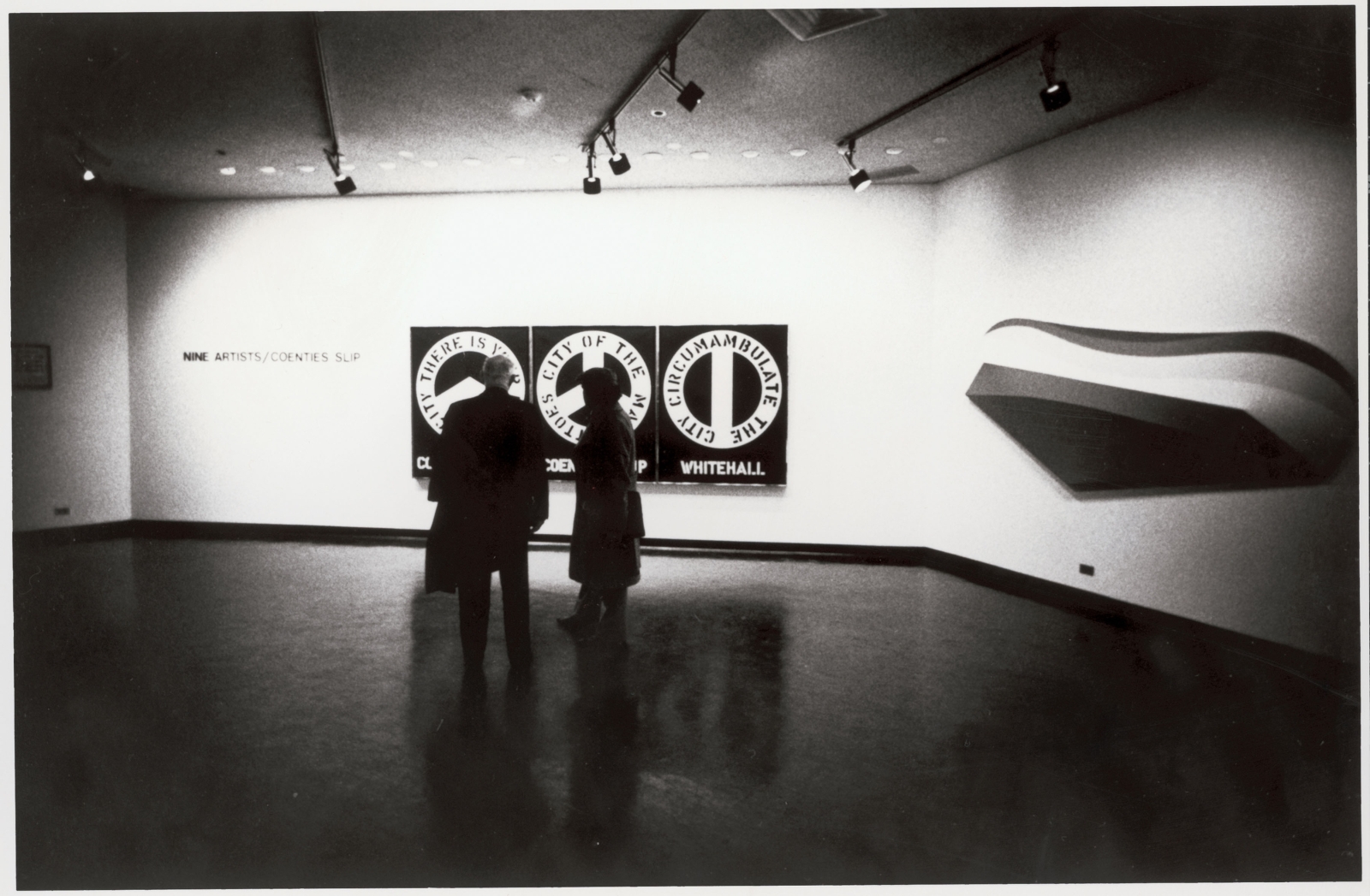 Installation view of Indiana&amp;rsquo;s The Melville Triptych (1961) and Charles Hinman&amp;rsquo;s Lift (1965) in the exhibition Nine Artists: Coenties Slip at the Whitney Museum of American Art Downtown, New York, January 10&amp;ndash;February 14, 1974. Image courtesy of The Star of Hope, Vinalhaven, Maine