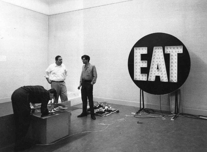 Robert Indiana's The Electric EAT being installed for the Exhibition Art Turned On, at the Institute of Contemporary Art, Boston, 1965