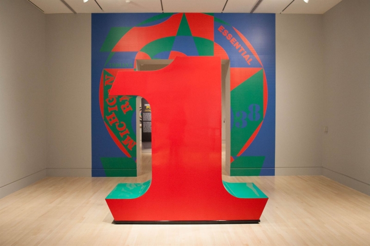 Installation view of The Essential Indiana at the Indianapolis Museum of Art with Indiana's large scale polychrome aluminum sculpture ONE