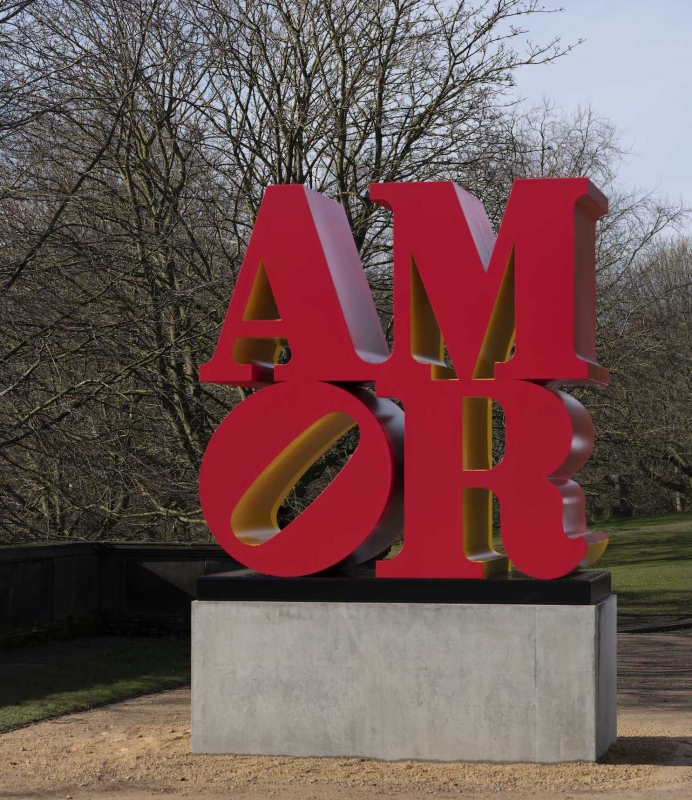 Robert Indiana's Red Yellow AMOR sculpture on display in the Yorkshire Sculpture Park