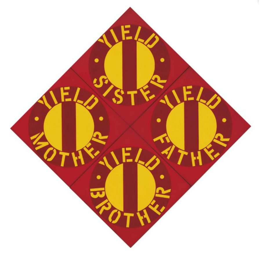The Red Yield Brother IV is a diamond shaped painting consisting of four panels, measuring 68 by 68 inches overall. Each panel contains a yellow circle with a dark red vertical band and a dark red ring with yellow text against a lighter red ground. The text reads, clockwise from top, "Yields Sister," "Yield Father," "Yield Brother," and "Yield Mother."